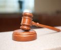 Gavel and legal document symbolizing US free casino regulations and sweepstakes law in 2026